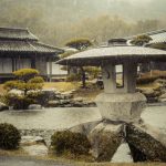 Pagoda statue in a Japanese garden on a rainy day