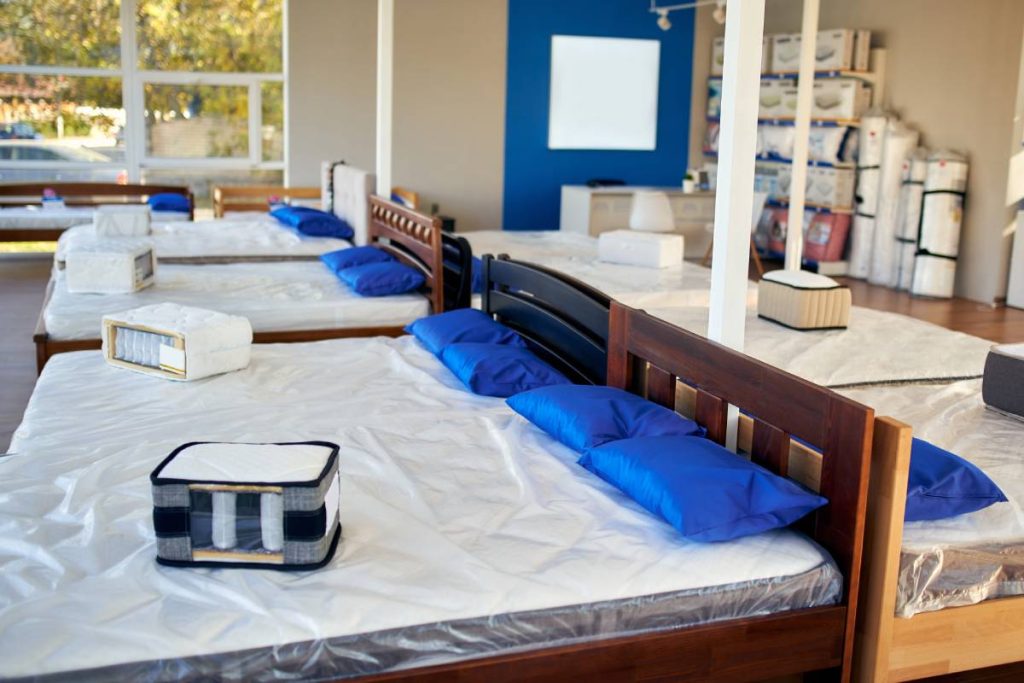 The interior of the store of beds, mattresses and pillows. Everything for a comfortable sleep.