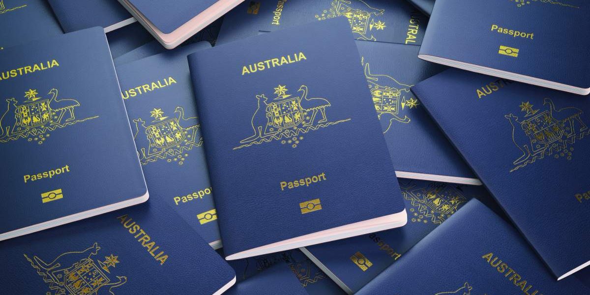 Passports of Australia background. Immigration or travel concept. Pile of australian passports. 3d illustration