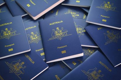 Passports of Australia background. Immigration or travel concept. Pile of australian passports. 3d illustration