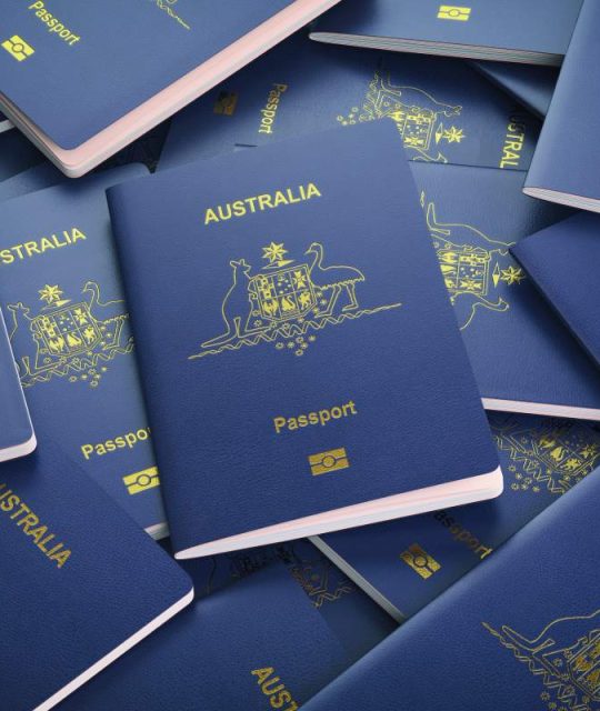 Passports of Australia background. Immigration or travel concept. Pile of australian passports. 3d illustration