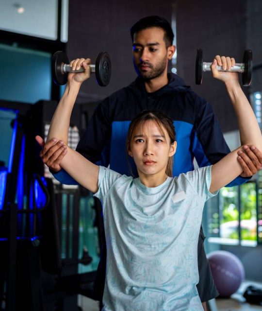 asian-man-and-woman-working-out-one-is-a-trainer-2024-09-25-05-04-47-utc (1)