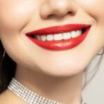Lips of a young girl close-up on a light background