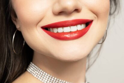 Lips of a young girl close-up on a light background